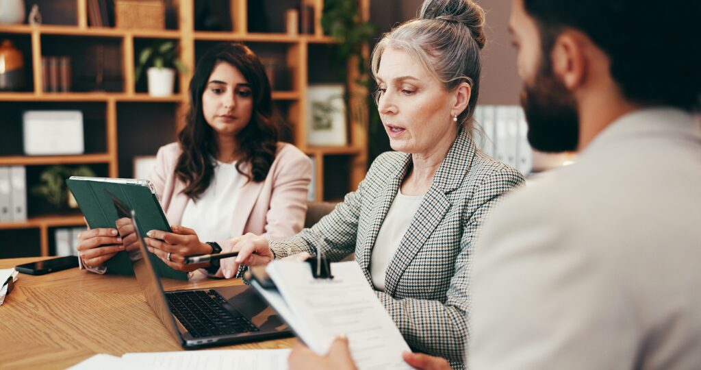 Discussion,,Laptop,And,Business,People,In,Office,With,Creative,Project